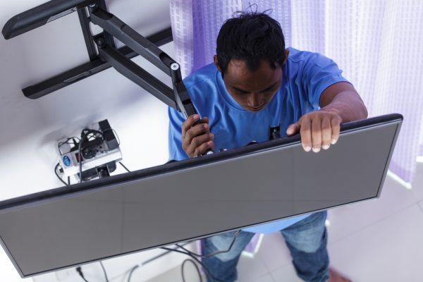 man-installing-tv-mount